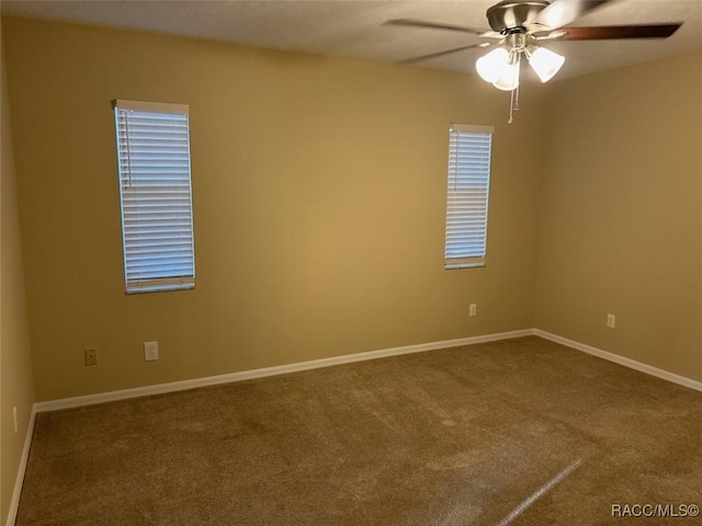 3365 S Crossbill Loop, Inverness, FL 34450 - carpeted spare room with a ceiling fan and baseboards