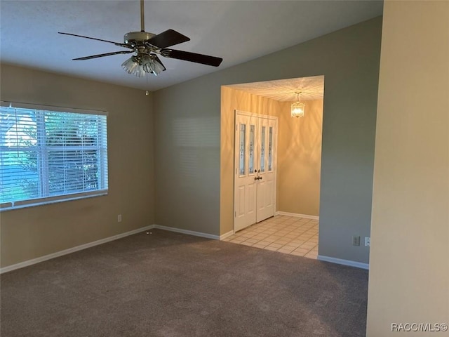 3365 S Crossbill Loop, Inverness, FL 34450 - empty room featuring carpet floors, ceiling fan, and tile patterned floors