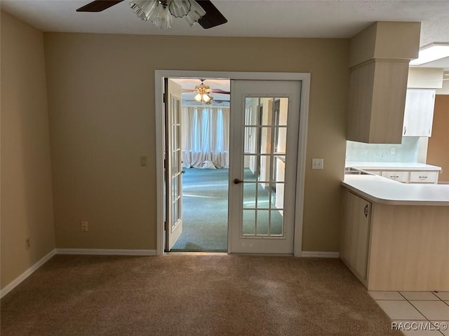 3365 S Crossbill Loop, Inverness, FL 34450 - doorway with ceiling fan and light carpet
