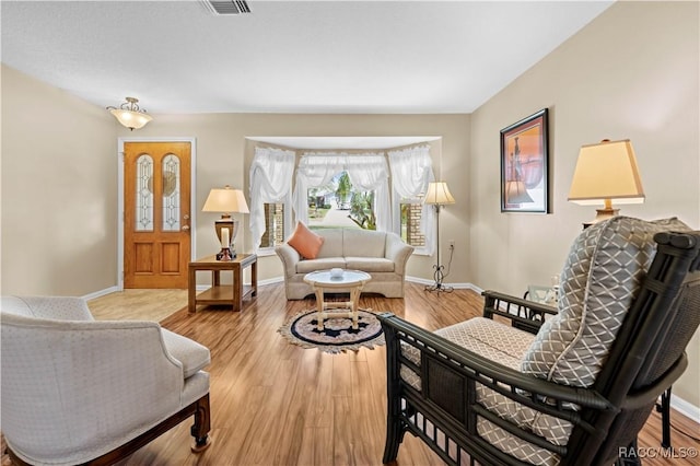 living room with hardwood / wood-style flooring