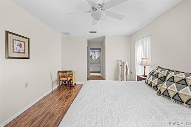 bedroom with ceiling fan and hardwood / wood-style floors