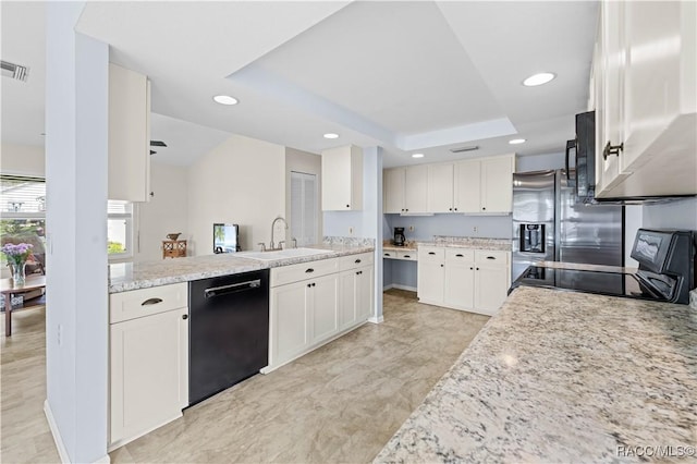 kitchen with sink, white cabinetry, a raised ceiling, light stone countertops, and black appliances