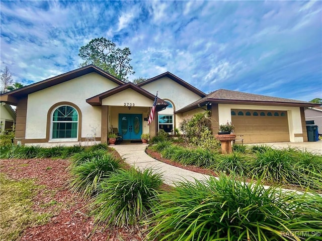 view of front of property featuring a garage