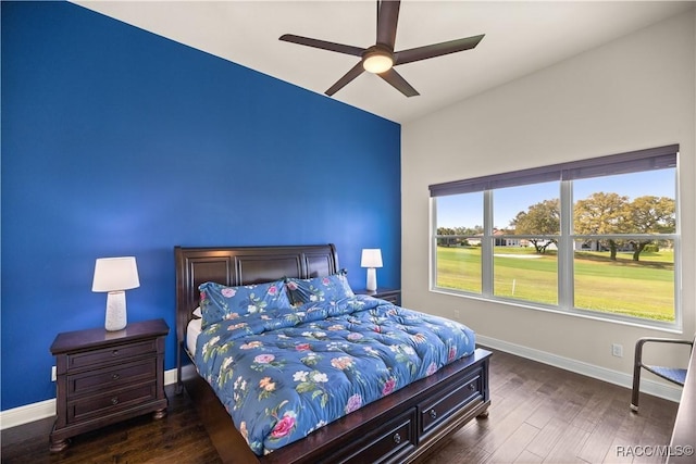 bedroom featuring dark hardwood / wood-style floors and ceiling fan