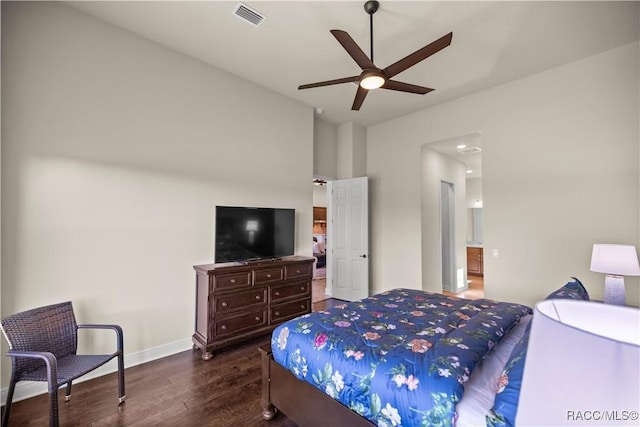 bedroom featuring dark hardwood / wood-style flooring and ceiling fan