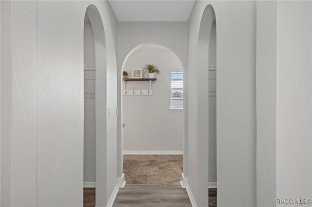 hallway featuring hardwood / wood-style floors