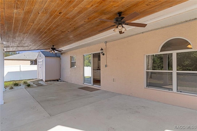 view of patio featuring a storage shed