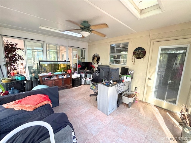 sunroom / solarium with ceiling fan