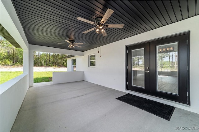 view of patio / terrace with french doors and a ceiling fan