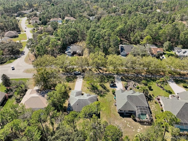 aerial view with a view of trees and a residential view