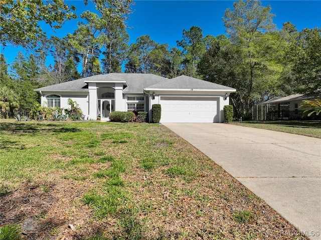 view of front of home with stucco siding, an attached garage, concrete driveway, and a front yard