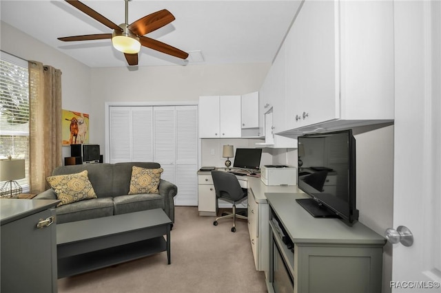 home office with light colored carpet and ceiling fan