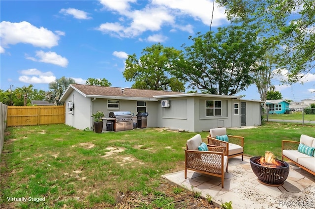 1 Taft St, Beverly Hills, FL 34465 - rear view of property with a patio area, stucco siding, and an outdoor living space with a fire pit