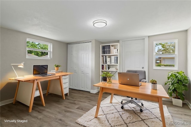 1 Taft St, Beverly Hills, FL 34465 - office area with light wood-style flooring and baseboards