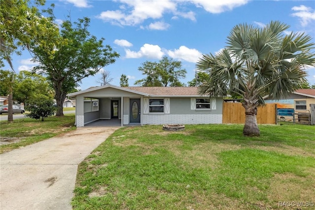 1 Taft St, Beverly Hills, FL 34465 - ranch-style home featuring concrete driveway, brick siding, and an attached carport