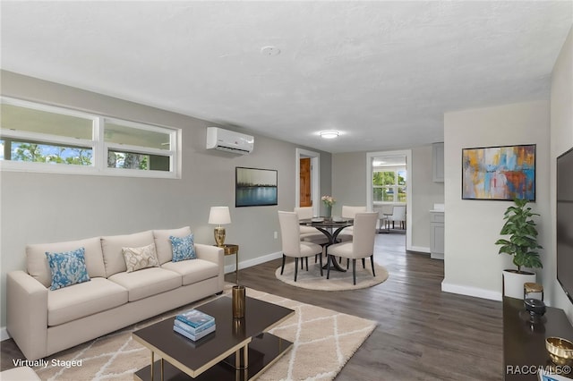 1 Taft St, Beverly Hills, FL 34465 - living area featuring a wall unit AC, baseboards, and dark wood-type flooring