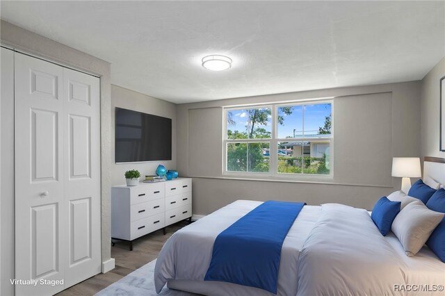 1 Taft St, Beverly Hills, FL 34465 - bedroom with wood finished floors and a closet