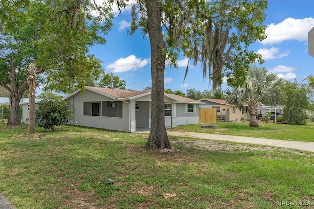 1 Taft St, Beverly Hills, FL 34465 - ranch-style home with a front lawn
