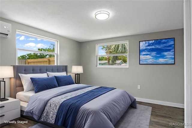 1 Taft St, Beverly Hills, FL 34465 - bedroom with a wall mounted AC, multiple windows, wood finished floors, and baseboards