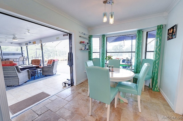 dining area featuring plenty of natural light, ceiling fan, and ornamental molding