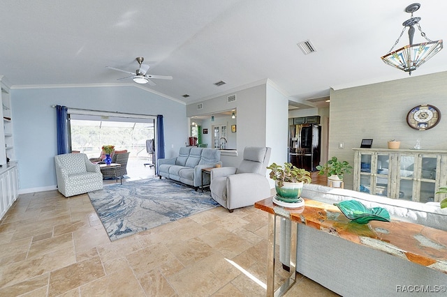 living room with ceiling fan with notable chandelier, vaulted ceiling, and ornamental molding