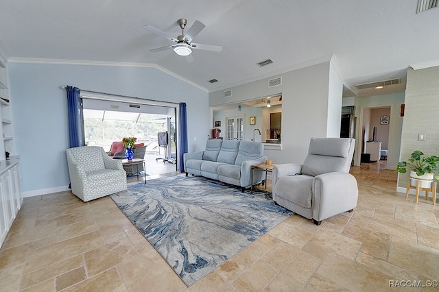 living room with crown molding, ceiling fan, and vaulted ceiling