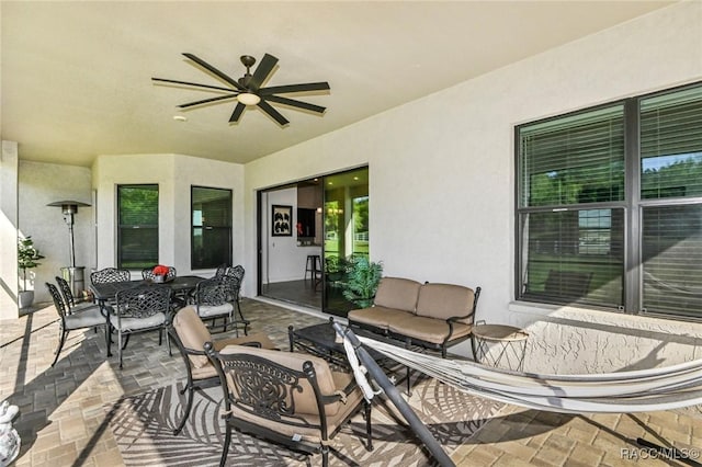 view of patio / terrace featuring ceiling fan and an outdoor hangout area