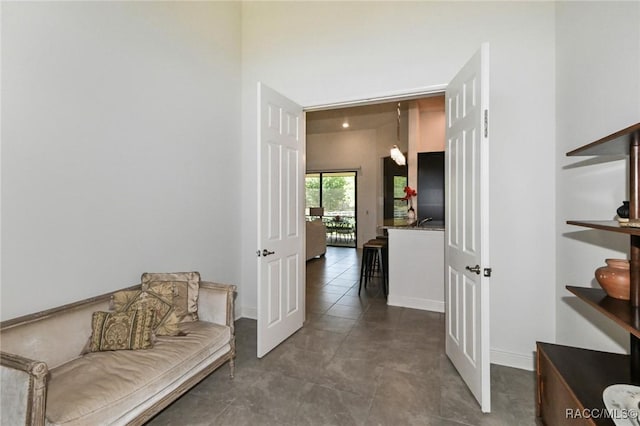 corridor featuring tile patterned flooring