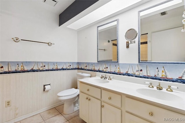 full bathroom featuring toilet, visible vents, a sink, and tile patterned floors