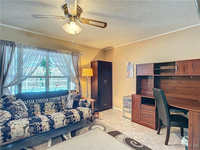 home office with light tile patterned flooring, ceiling fan, a textured ceiling, and crown molding