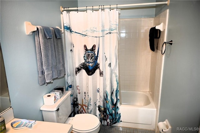 bathroom with toilet, shower / tub combo, and tile patterned floors