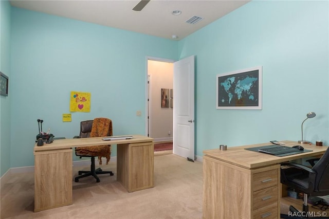 office area featuring ceiling fan and light colored carpet