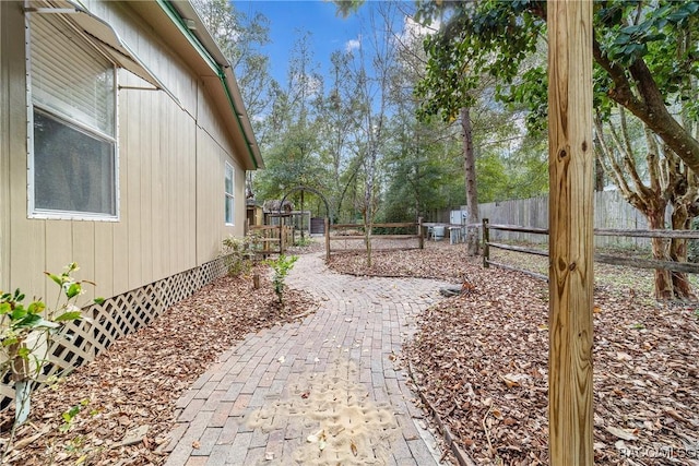 view of yard with a fenced backyard