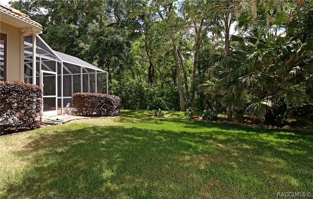 view of yard featuring a lanai