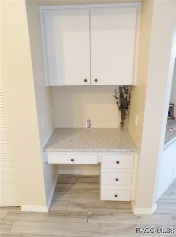 4614 N Crestline Dr, Beverly Hills, FL 34465 - unfurnished office with built in study area and baseboards