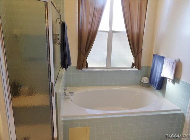 4614 N Crestline Dr, Beverly Hills, FL 34465 - bathroom with a shower stall and a bath
