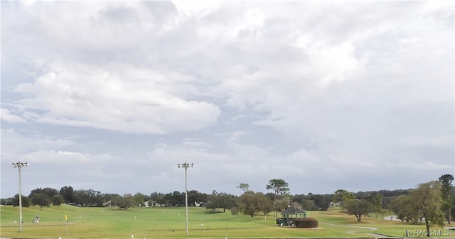 view of property's community with a gazebo and a lawn