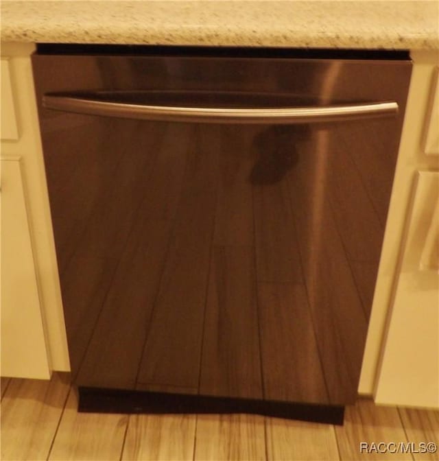 4614 N Crestline Dr, Beverly Hills, FL 34465 - kitchen view of stainless steel dishwasher and light countertops