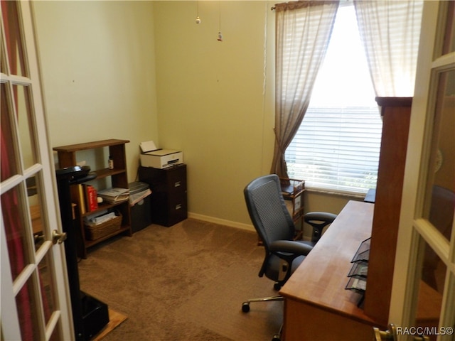 home office featuring carpet and plenty of natural light