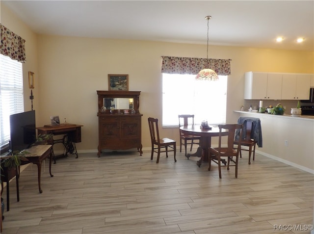 dining room featuring light wood-type flooring