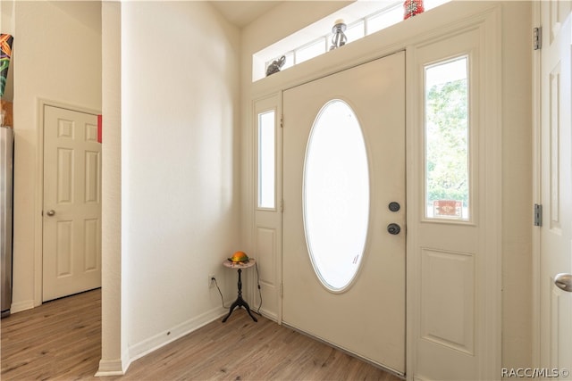 entrance foyer with light hardwood / wood-style floors