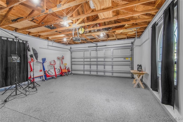 garage featuring a garage door opener