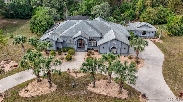 view of front of property featuring a lanai