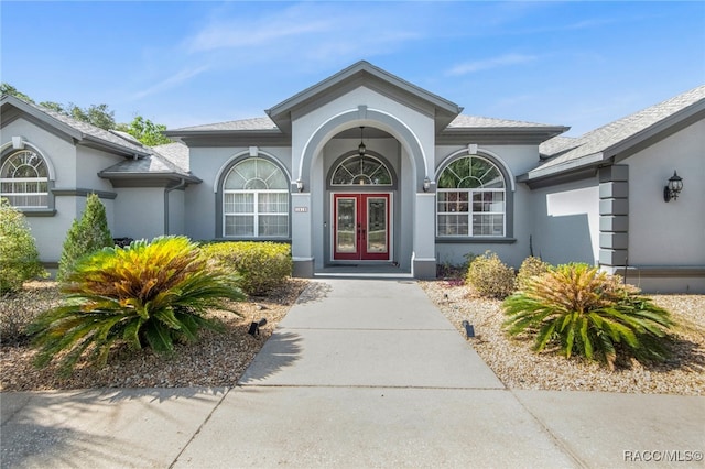 view of exterior entry with french doors