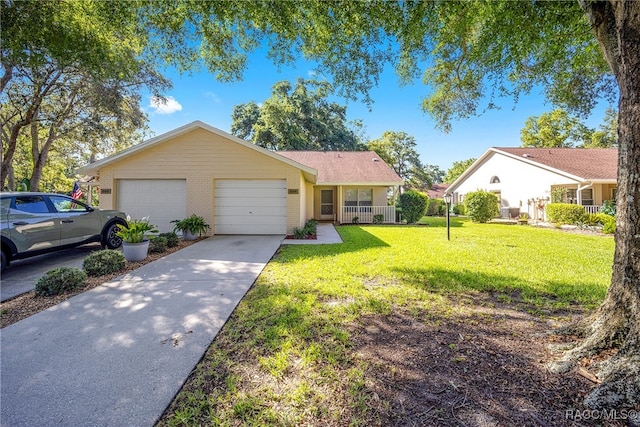 ranch-style house with a front lawn, a porch, and a garage