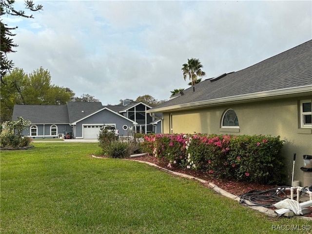 705 E Dakota Ct, Hernando, FL 34442 - view of grassy yard featuring an attached garage