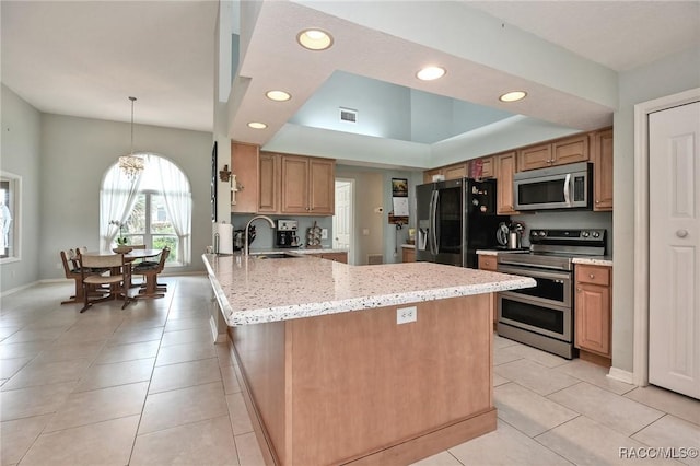 705 E Dakota Ct, Hernando, FL 34442 - kitchen featuring stainless steel appliances, a sink, a peninsula, light tile patterned flooring, and recessed lighting