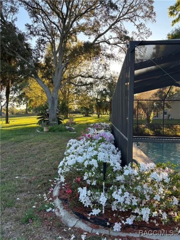 705 E Dakota Ct, Hernando, FL 34442 - view of green lawn with glass enclosure