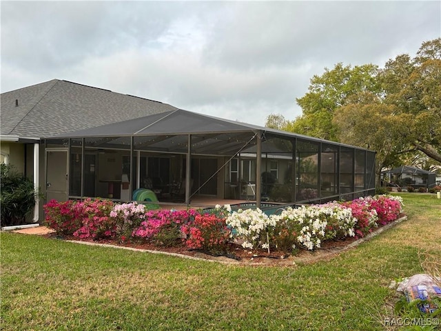 705 E Dakota Ct, Hernando, FL 34442 - rear view of property featuring a yard and a lanai