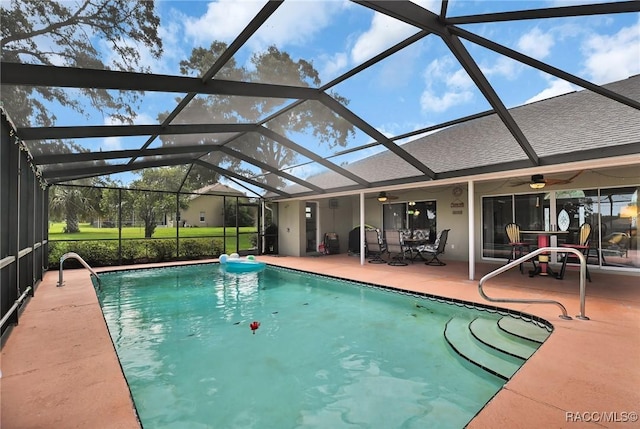 705 E Dakota Ct, Hernando, FL 34442 - outdoor pool featuring ceiling fan, a patio area, and glass enclosure